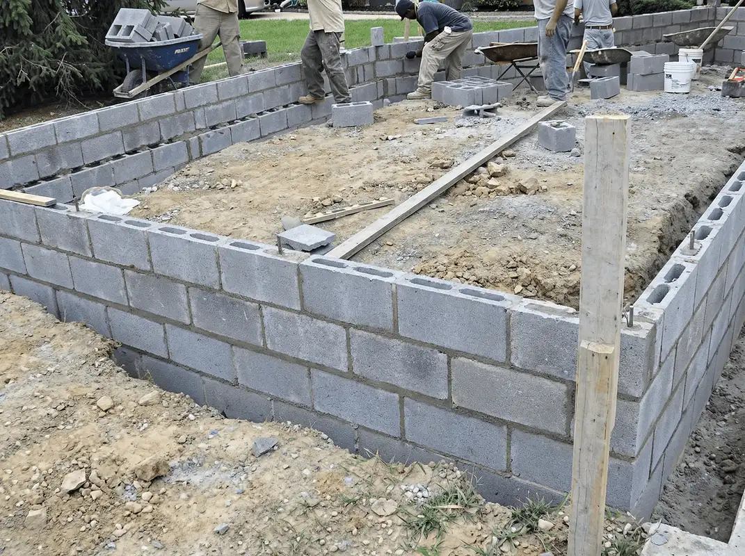 Professionals building a foundation with blocks in Ogden, UT